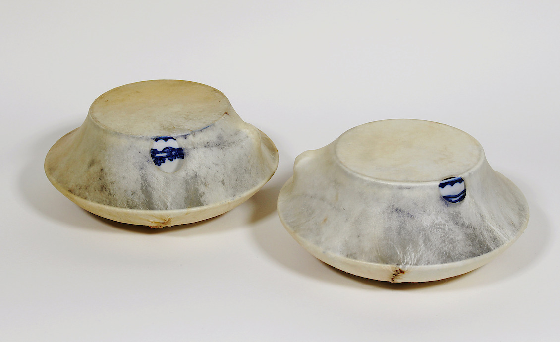 Skin and Bones, 2017, ceramic, rawhide, 5.75 dia x 2.5 in each